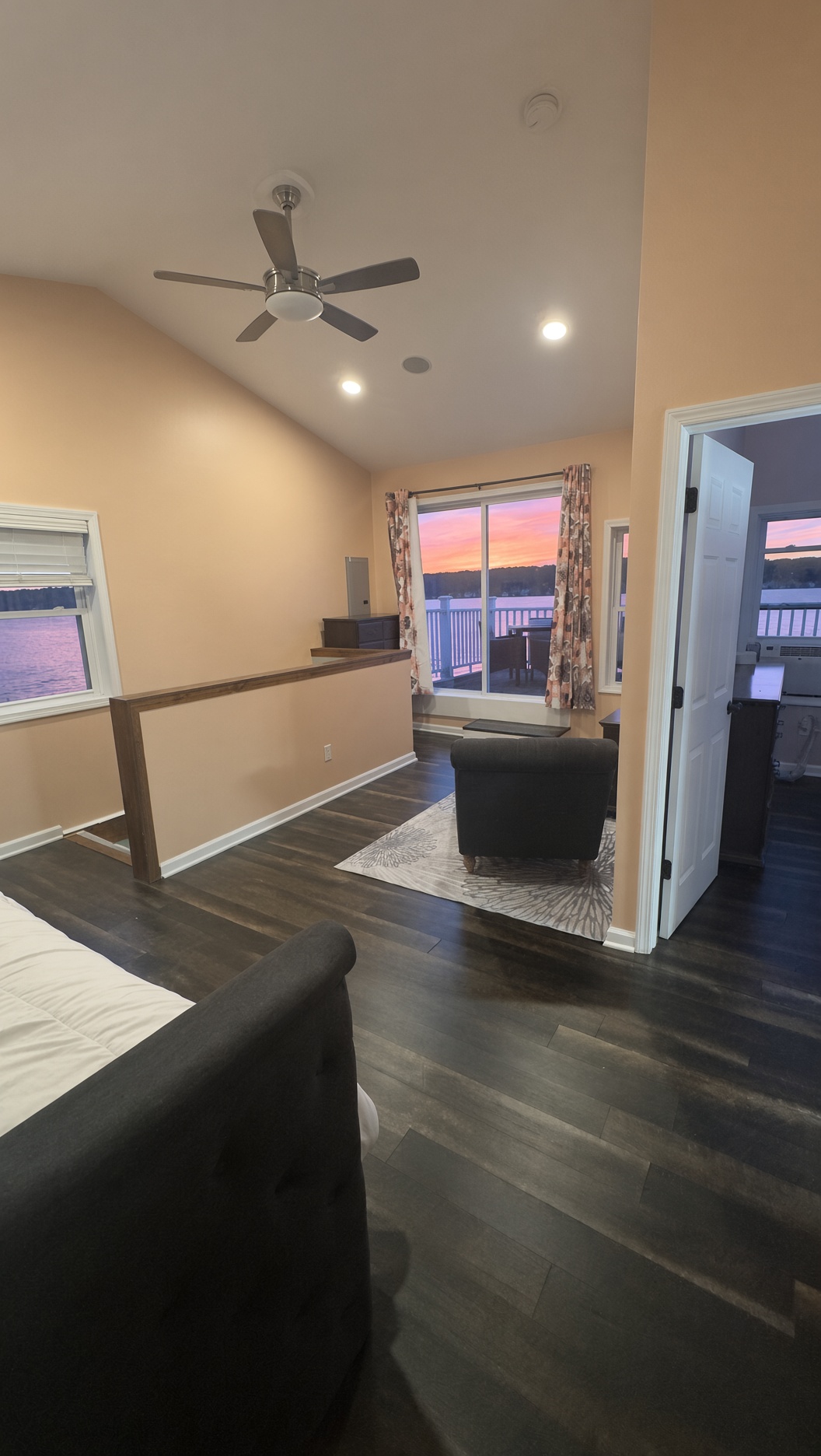Open loft sleeping area in the waterfront home