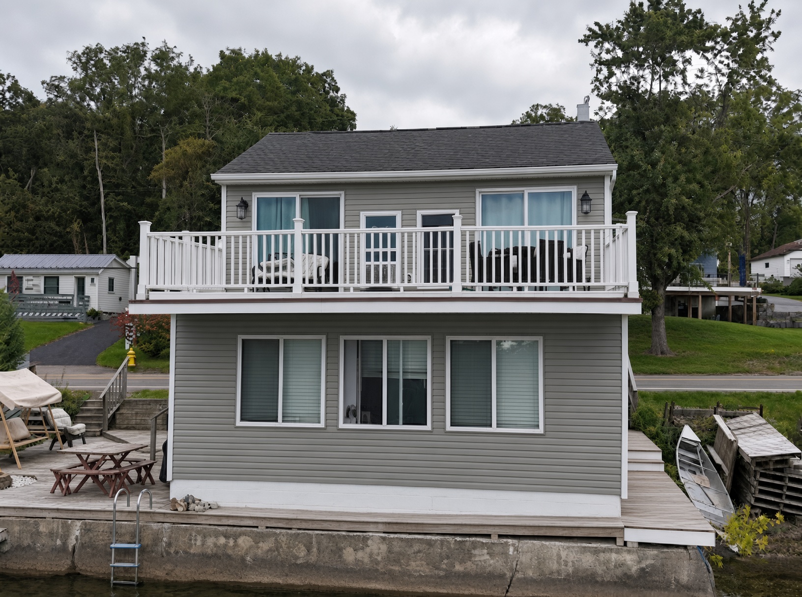 Waterfront exterior of 4480 East Lake Road from Conesus Lake